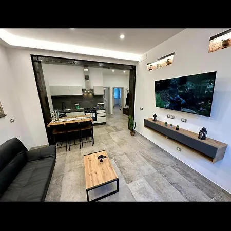 Koman House *